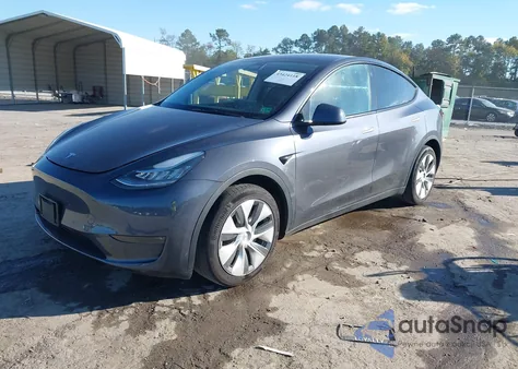 2023 Tesla Model Y Awd/Long Range Dual Motor All-Wheel Drive z USA, uszkodzony, nr VIN 7SAYGDEE4PA124374